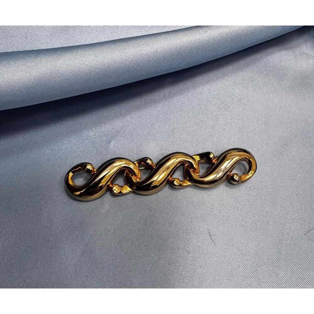Gold Tone "S" Scrolling Horizontal Brooch